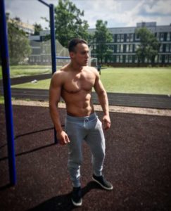 Russian muscle man outside